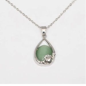 Celtic Green Cats Eye Claddagh Pendant
